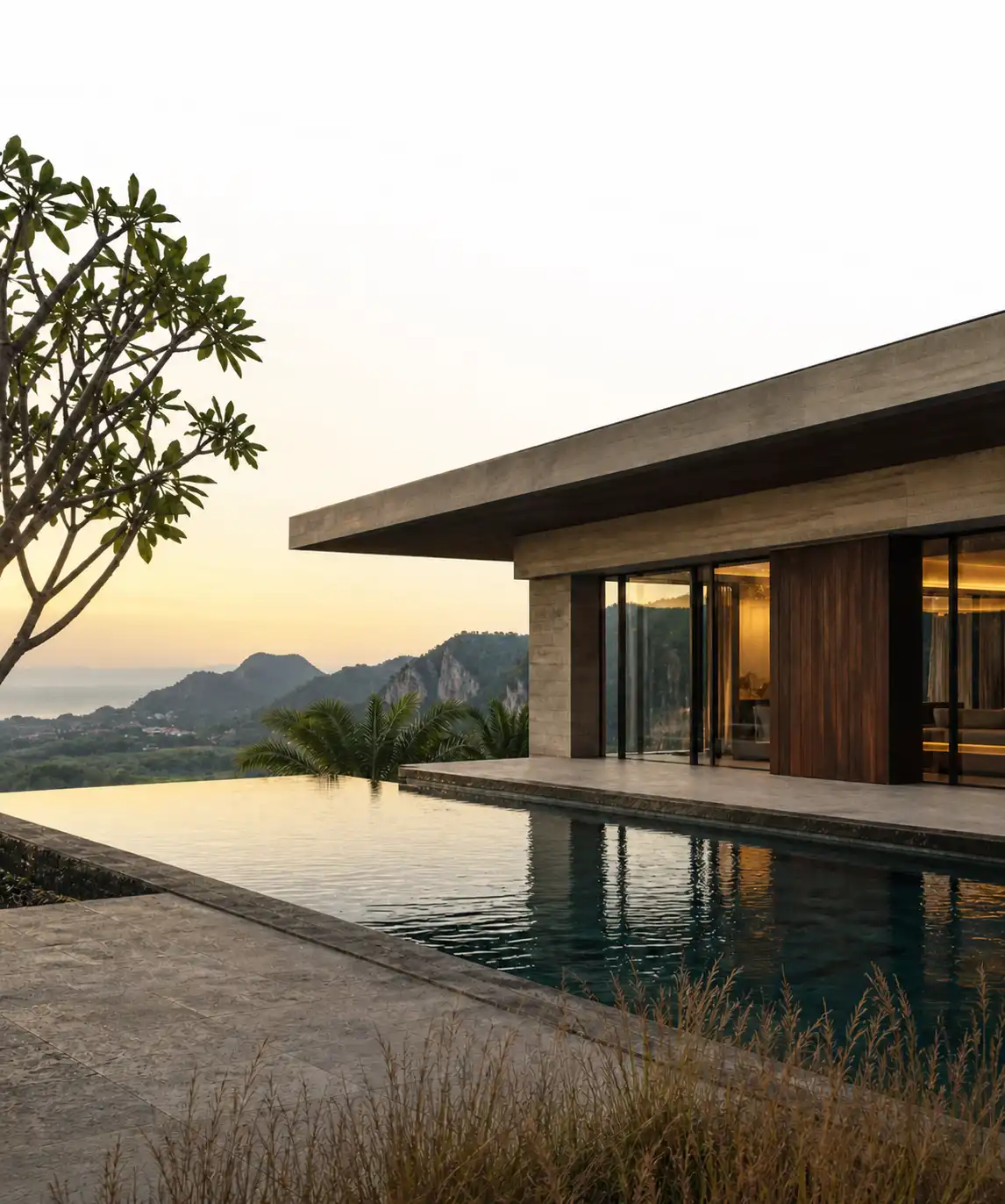 Modern luxury villa with infinity pool at dusk